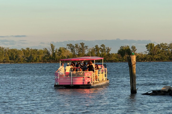 a small boat in a large body of water